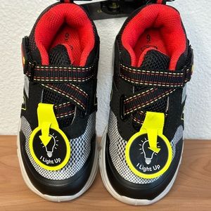 Athletic boys tennis shoes sz. 9. NWT. Black and silver, Velcro tabs. Light ups!